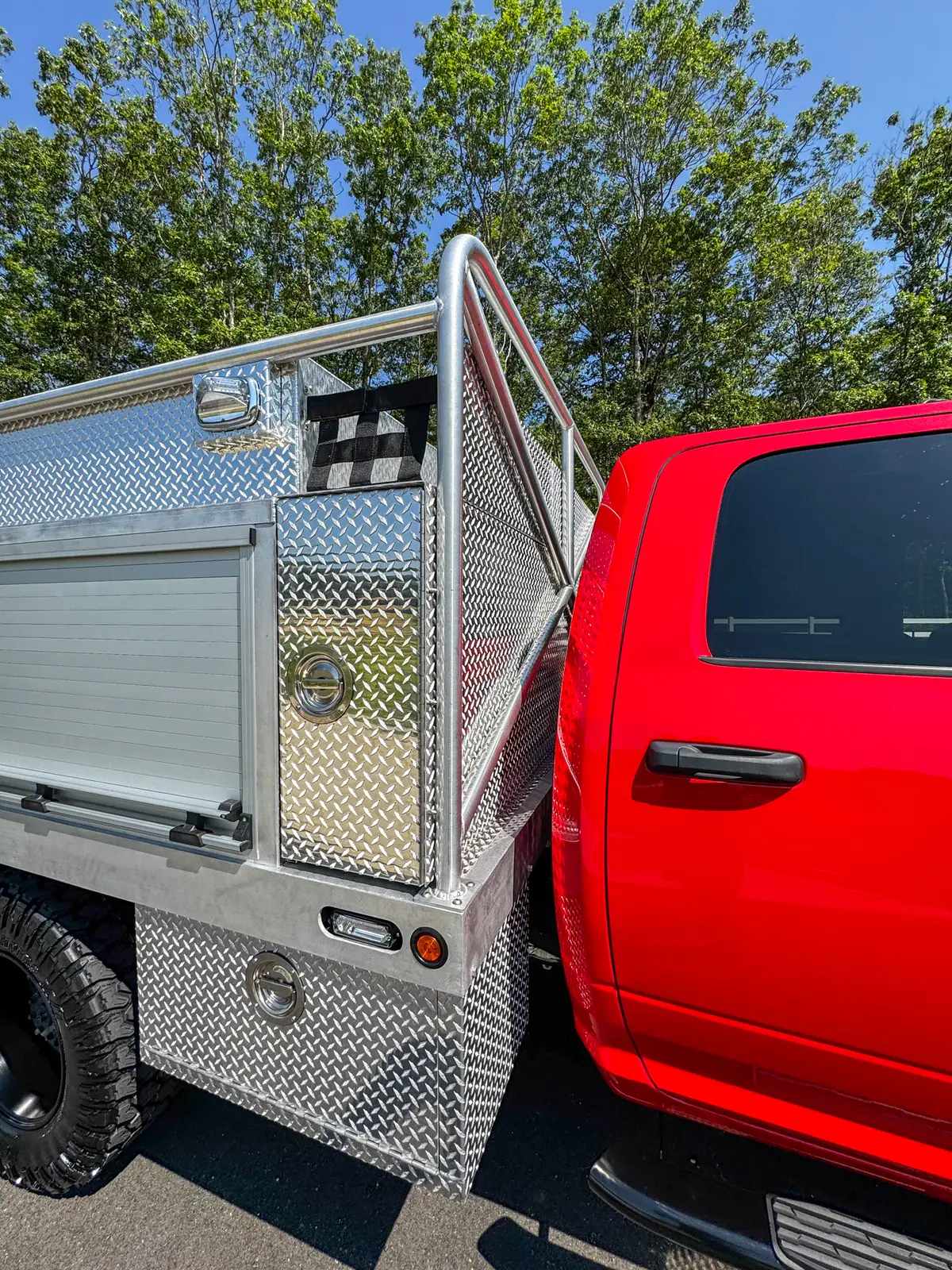 Right-side body view with vertical access door and long compartment open.